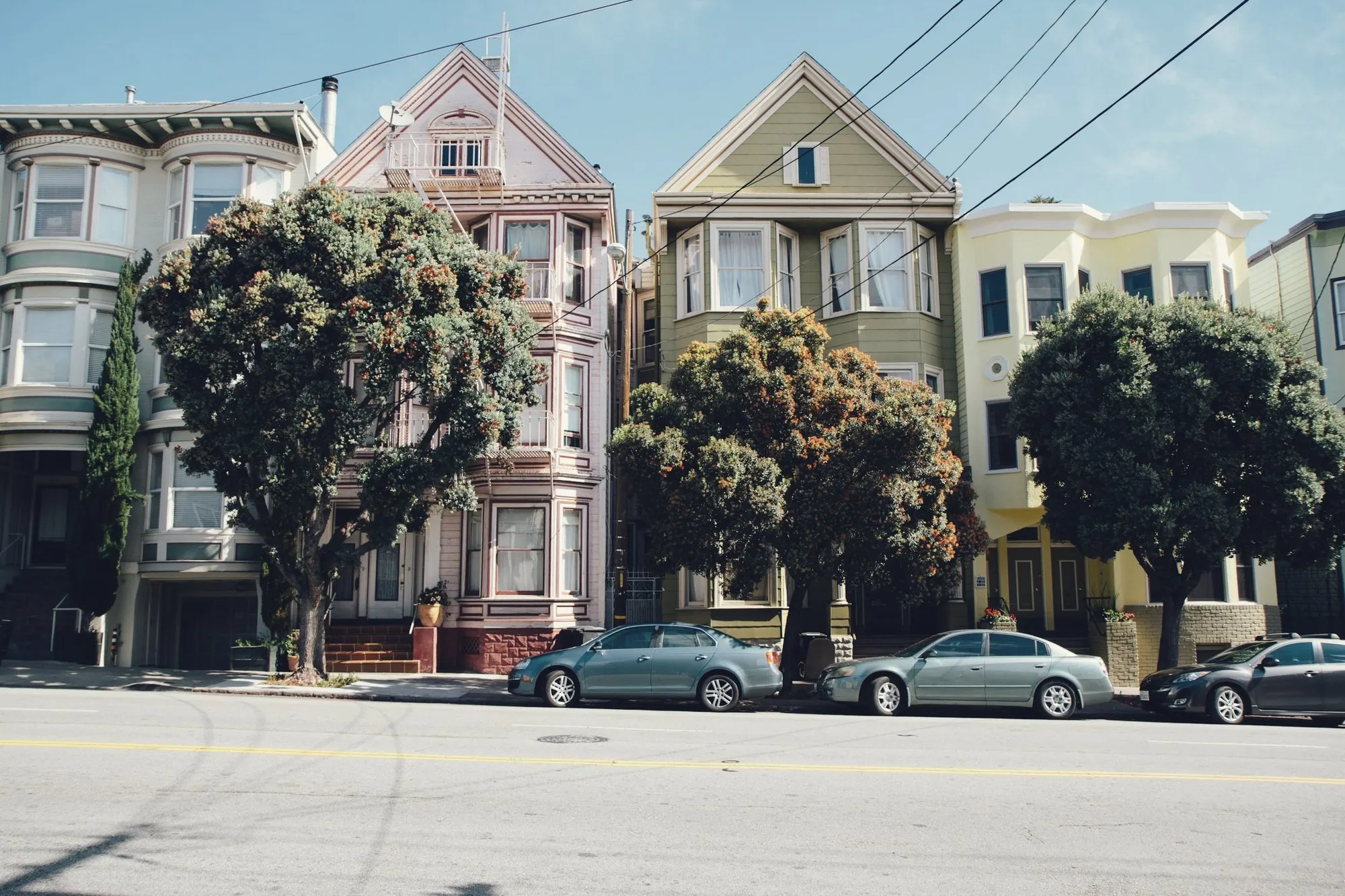 Row of colorful Victorian houses on a San Francisco street